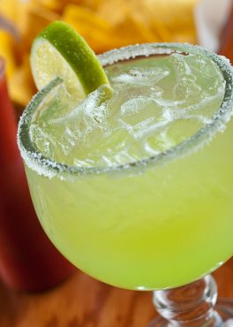 Frozen margarita with lime and frosted rim